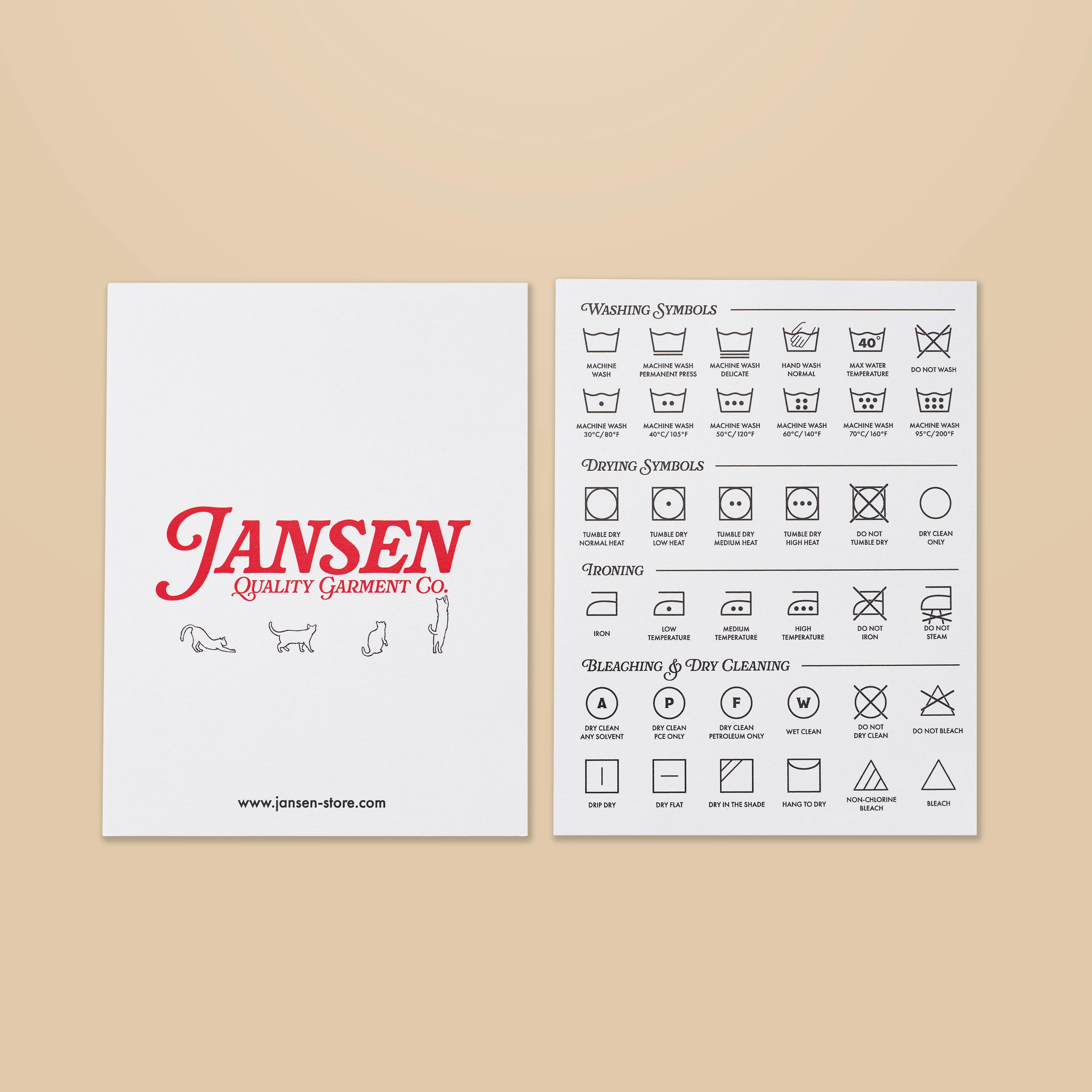 Two sheets of paper with Jansen Quality Garment Co. logo and laundry symbols on a beige background.