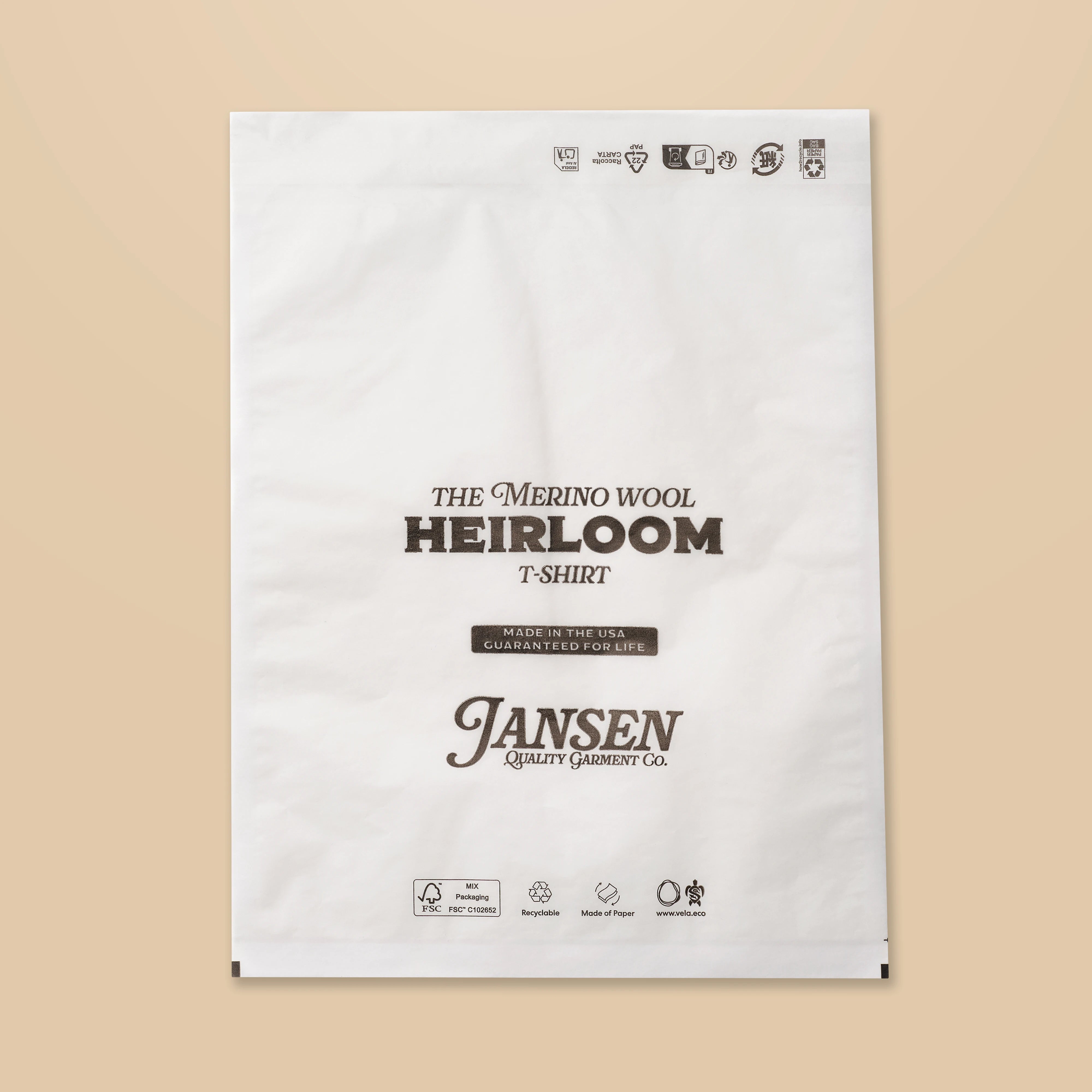 Jansen t-shirt packaging with text on a beige background